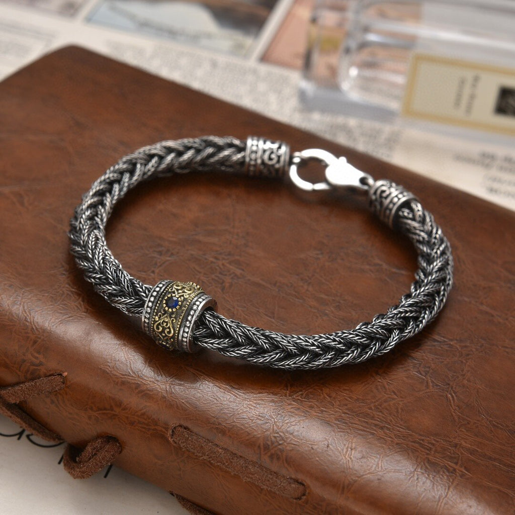 Elegant Antique-Influenced Bracelet and a Blue Corundum Stone