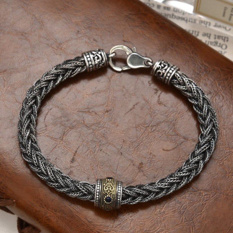 Elegant Antique-Influenced Bracelet and a Blue Corundum Stone