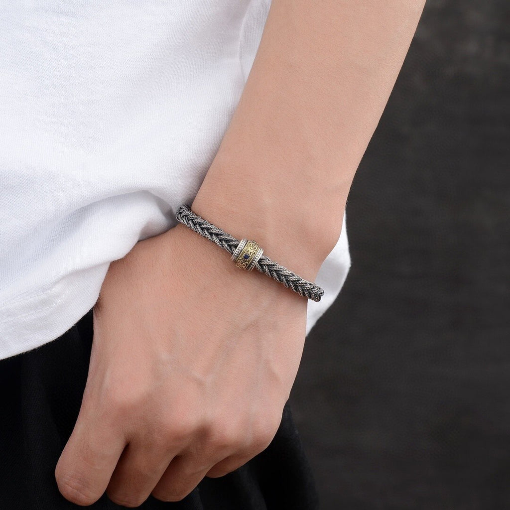 Elegant Antique-Influenced Bracelet and a Blue Corundum Stone