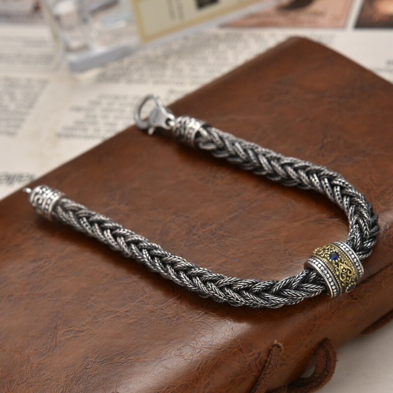 Elegant Antique-Influenced Bracelet and a Blue Corundum Stone