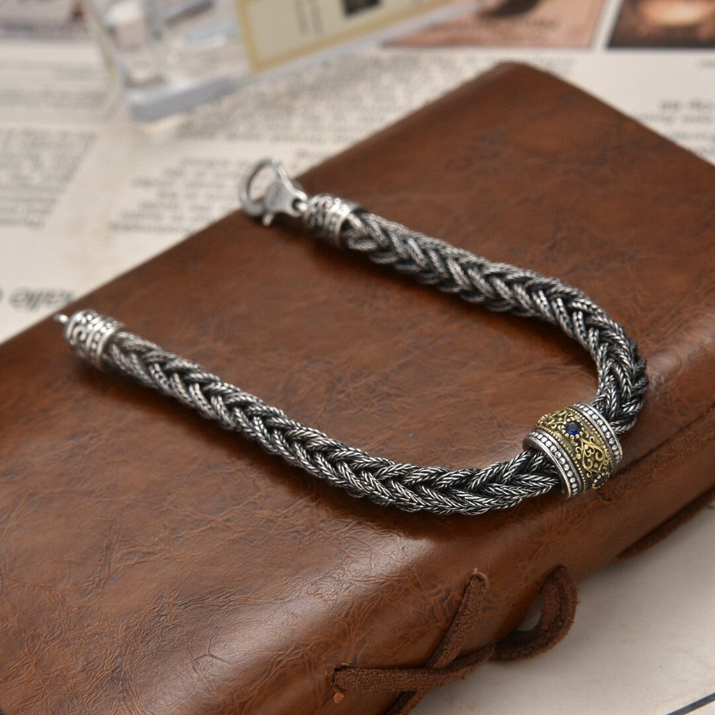 Elegant Antique-Influenced Bracelet and a Blue Corundum Stone