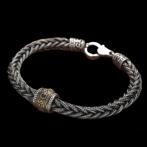 Elegant Antique-Influenced Bracelet and a Blue Corundum Stone