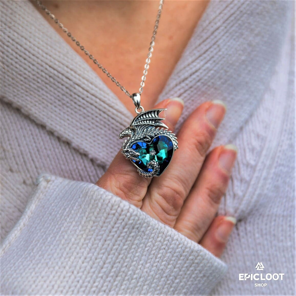 925 Silver Dragon guards a blue crystal heart necklace.
